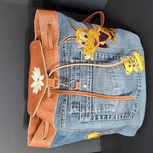 Vintage Jean/Faux Leather Medium Backpack with added Character Patches .